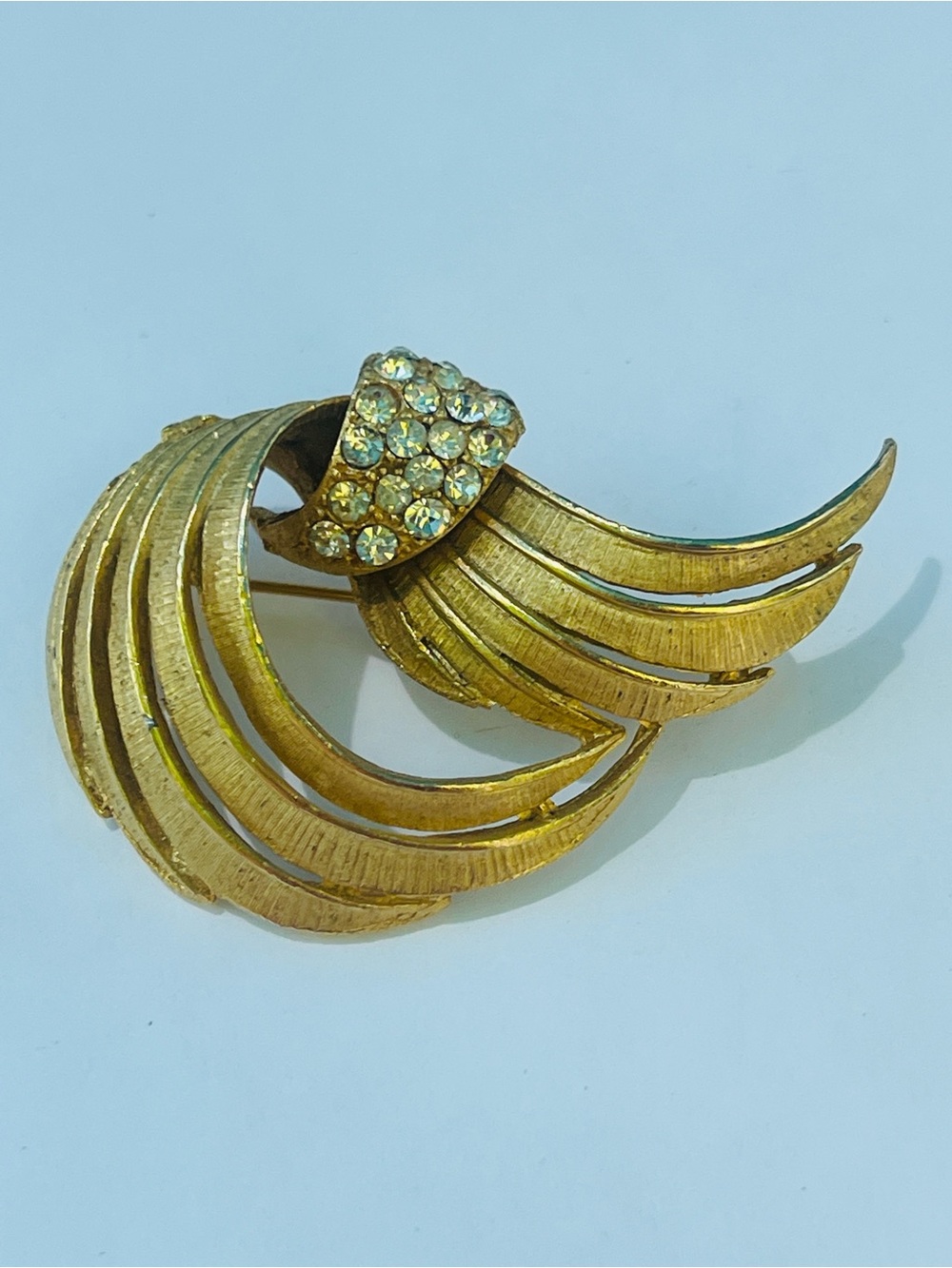 Givenchy Gold-plated Crystal Accent Swirl Brooch with Crystal embellishment